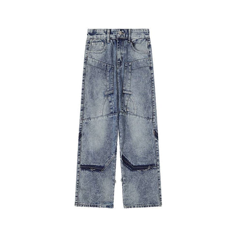 DISTRESSED PATCH JEANS