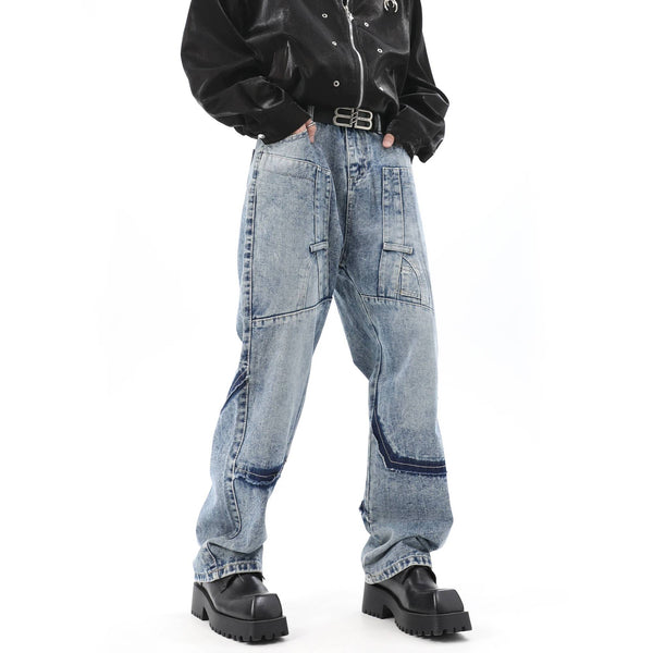 DISTRESSED PATCH JEANS