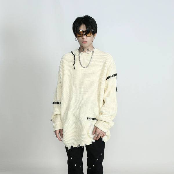 RIPPED KNITTED SWEATER