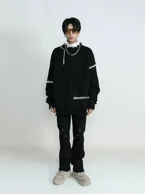 RIPPED KNITTED SWEATER