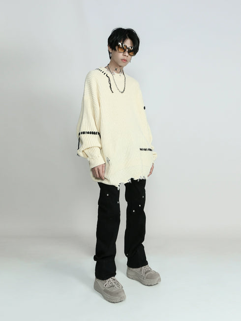 RIPPED KNITTED SWEATER